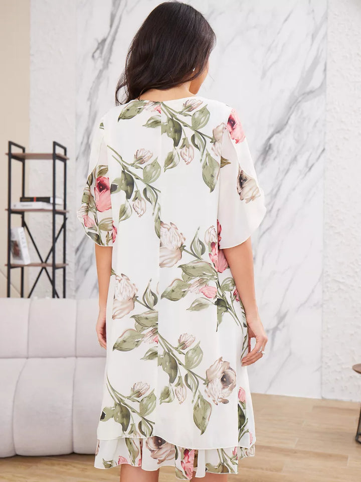 Elegant above-knee floral dress for women, featuring flowy short sleeves and a stylish ruffle hem.