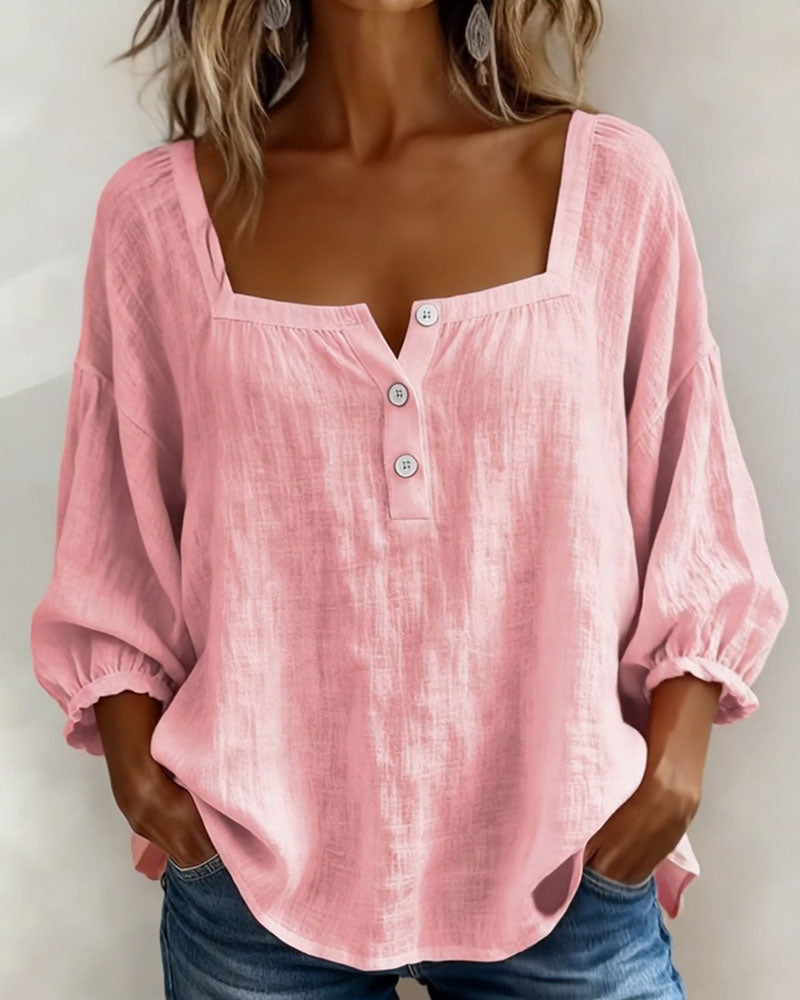 Women's stylish relaxed fit puff sleeve blouse with an elegant square neck.