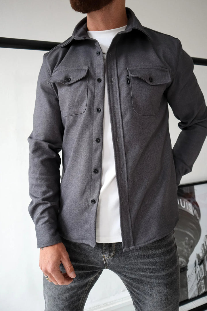 Stylish women's button-down shirt jacket. Water-resistant, long-sleeve outerwear for a chic, modern, casual look.