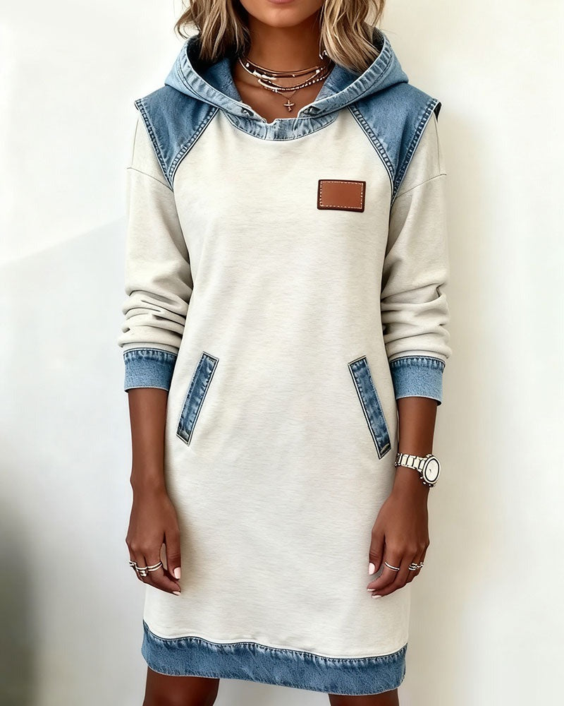 Casual chic women's hooded dress for comfortable everyday wear. Effortless modern style and urban fashion.