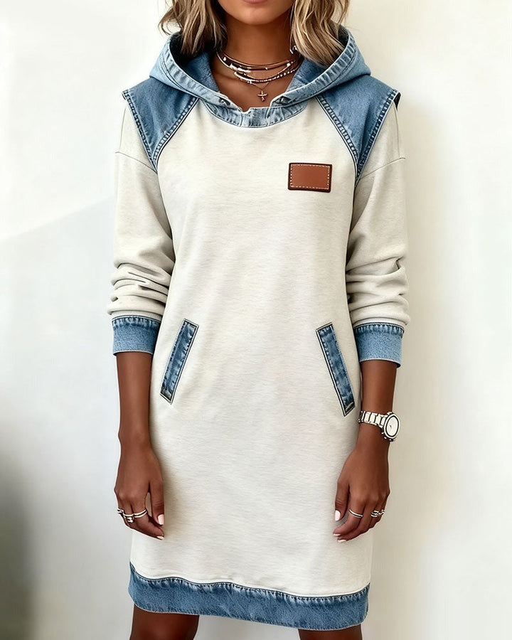 Casual chic women's hooded dress for comfortable everyday wear. Effortless modern style and urban fashion.