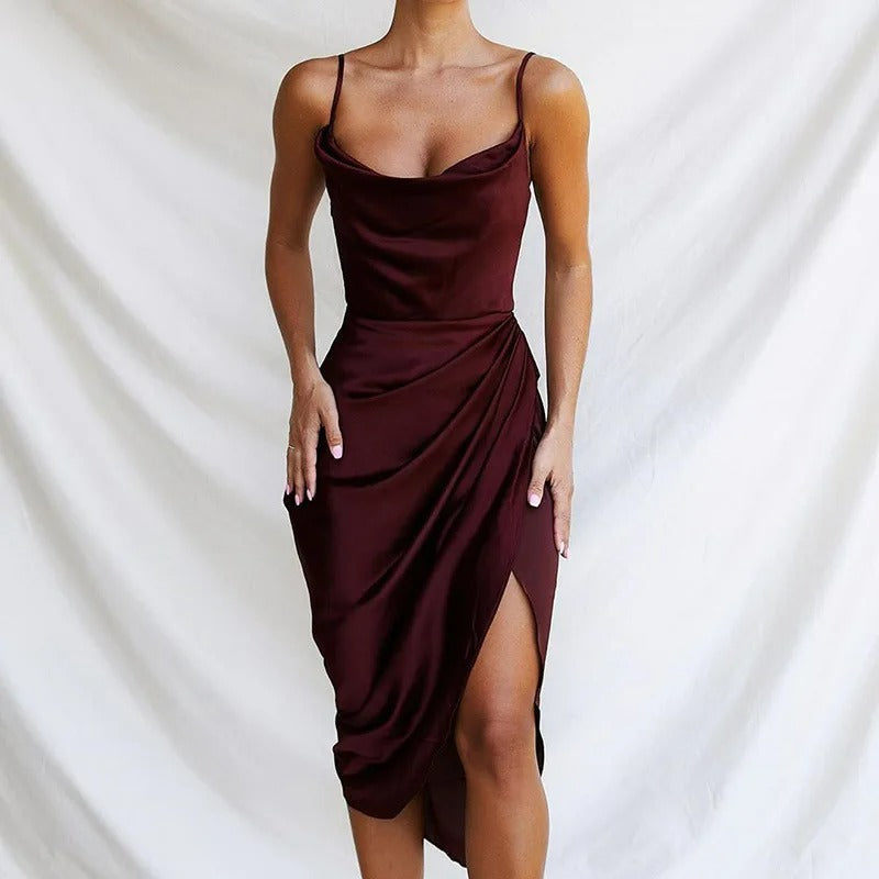 Chic & feminine women's mini dress with elegant ruffles & narrow straps. Ideal for summer parties.