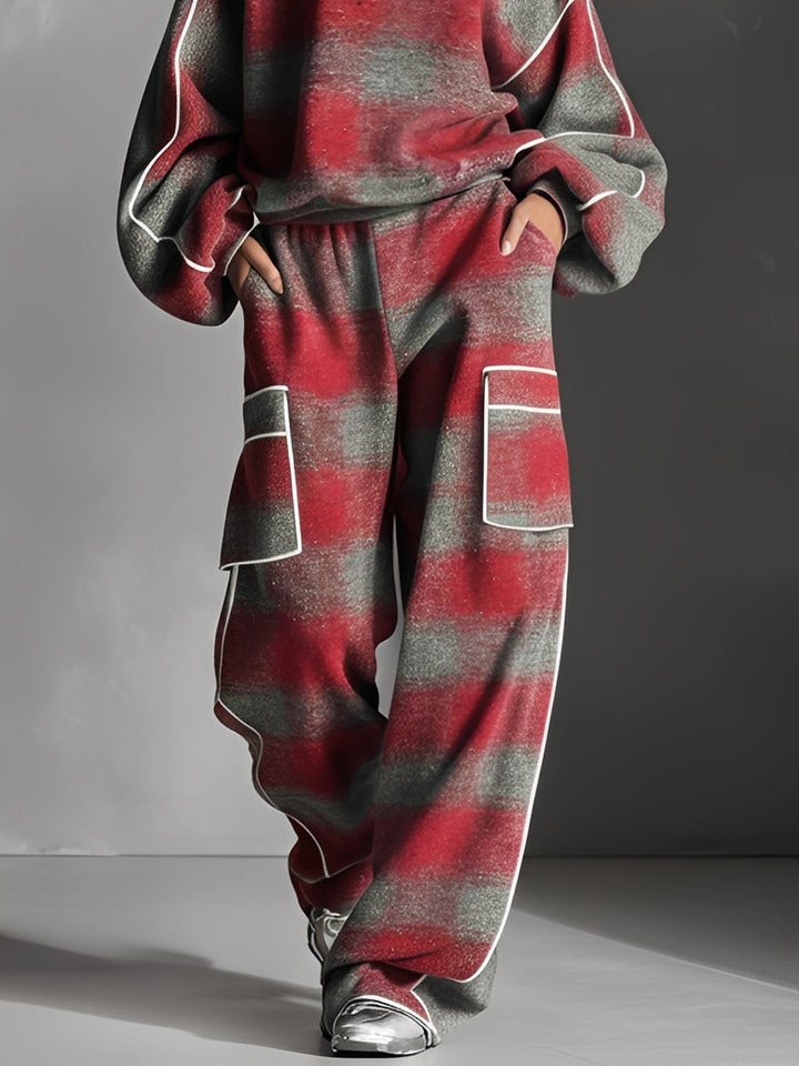 Relaxed fit women's two-piece set with a trendy graphic print. Comfortable and stylish for casual wear.