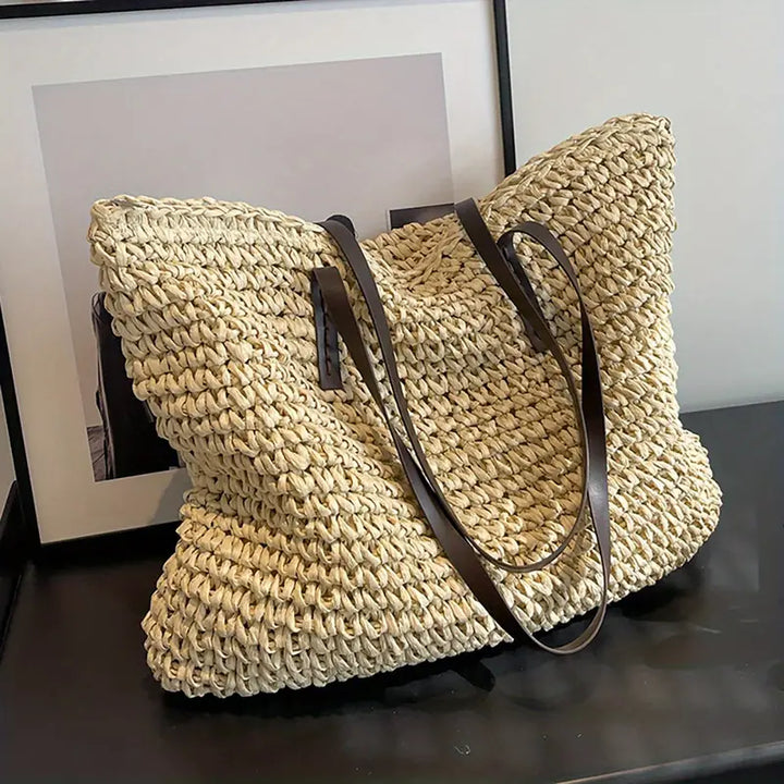 Spacious women's woven beach tote bag, large capacity and bohemian style for travel.