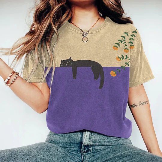 Playful women's two-tone cat graphic tee. Loose fit & comfortable for casual fashion, perfect for everyday style.