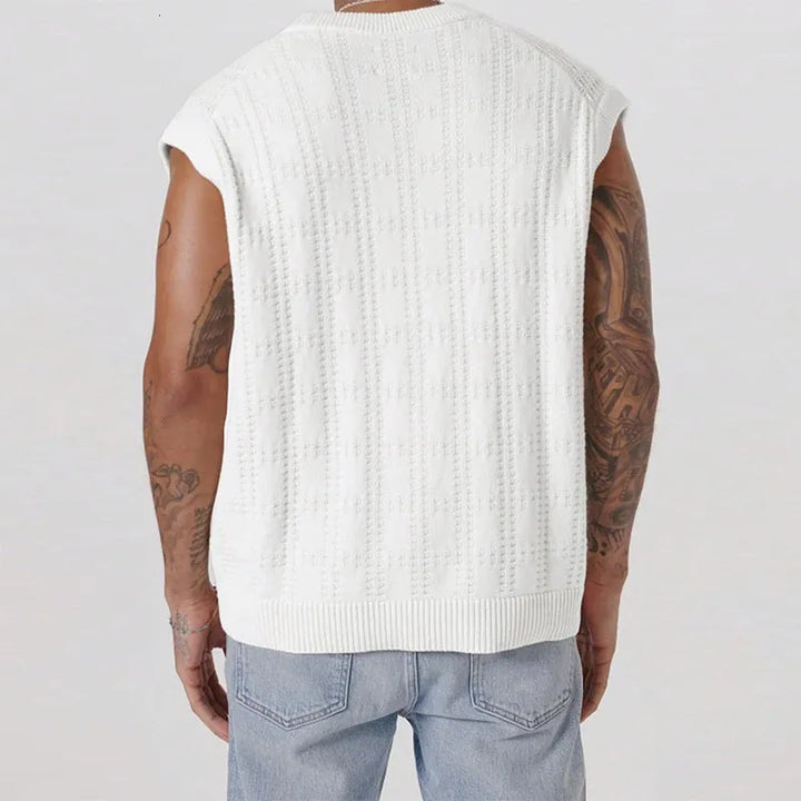 Stylish men's sleeveless knitted vest in white. Features a button front and textured knit, perfect for summer.