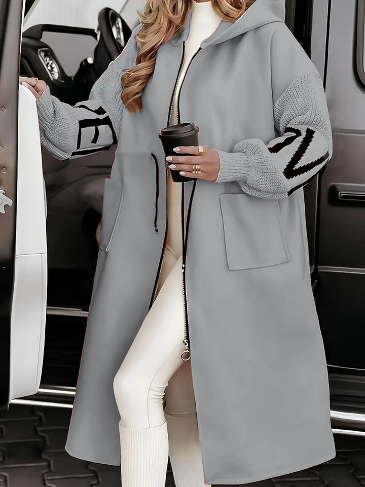 Smart casual women's hooded coatigan, perfect for transitional weather and elegant, comfortable layering.