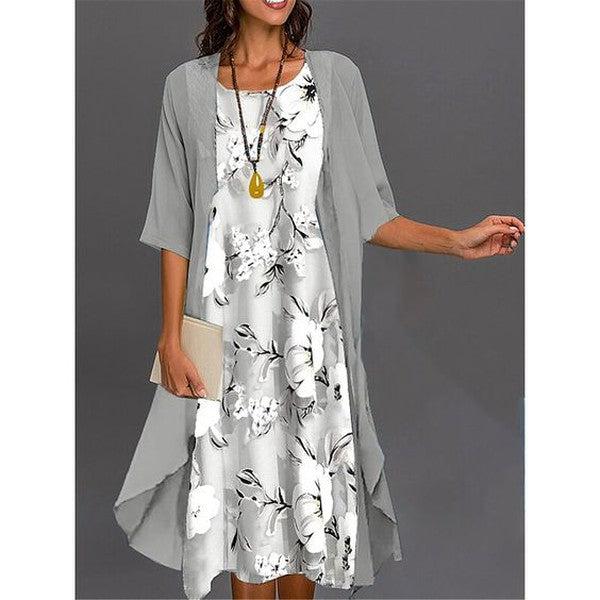 Women's elegant gray printed midi dress with versatile outerwear, perfect for casual or office fashion.
