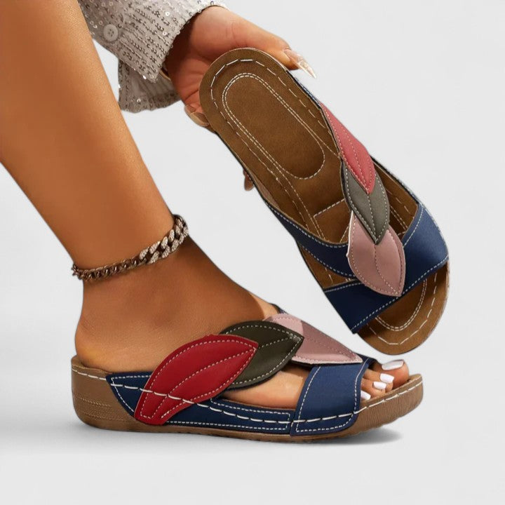 Stylish women's comfort sandals featuring strong arch support, ideal for walking & summer.