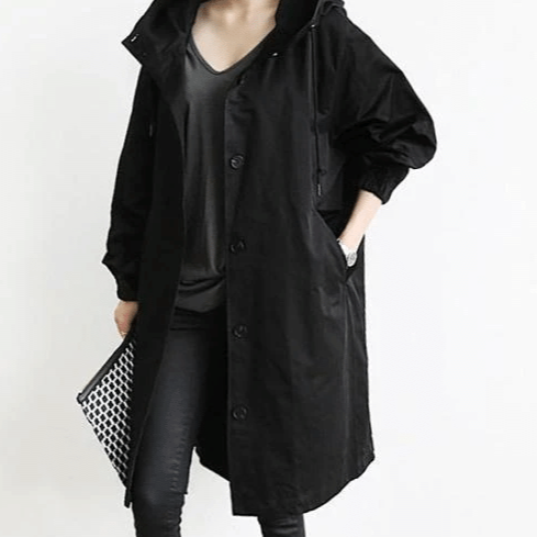 Waterproof women's jacket for outdoor adventures, hooded and stylish for ultimate comfort.