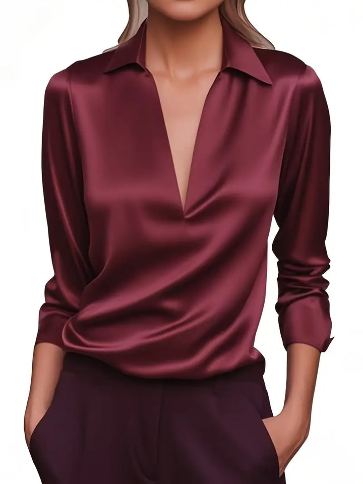 Refined women's long sleeve V-neck blouse. Collared and elegant, perfect for business casual wardrobes.