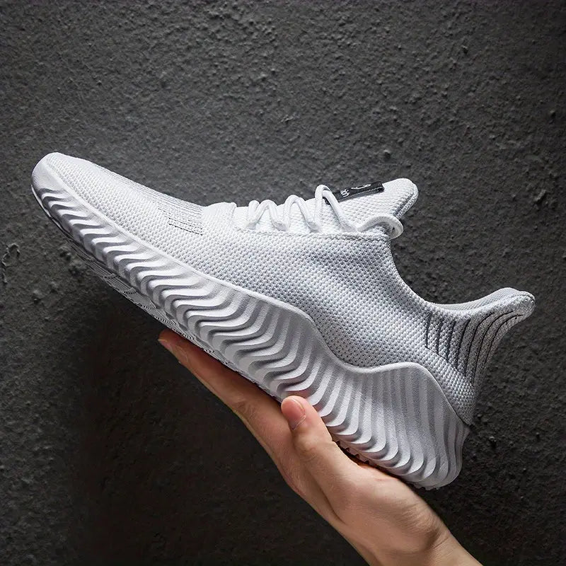 Men's lightweight lace-up sneakers for running, active wear, and casual comfort. Ideal athletic footwear.