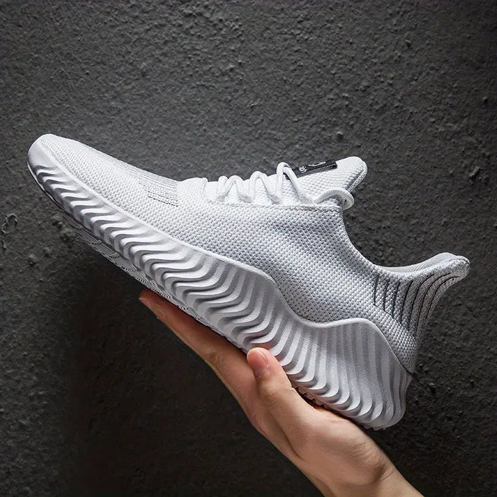 Men's lightweight lace-up sneakers for running, active wear, and casual comfort. Ideal athletic footwear.