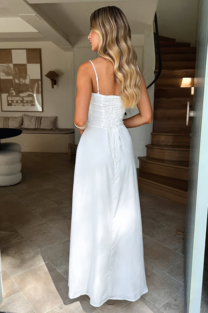 Women's A-line maxi dress, sweetheart neckline, corset bodice, and delicate tie details for a chic look.