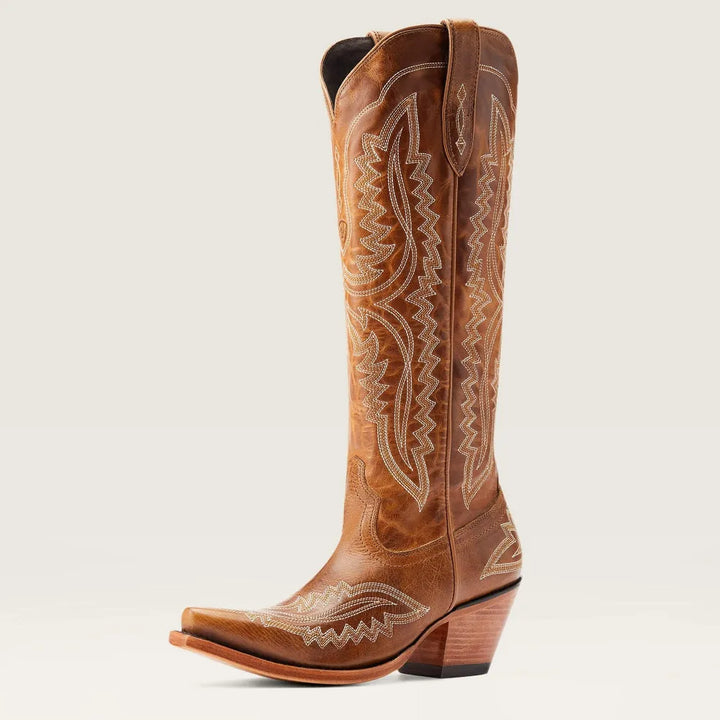 Side view of women's elegant patterned tall boots with a sharp pointed toe and convenient side zip.