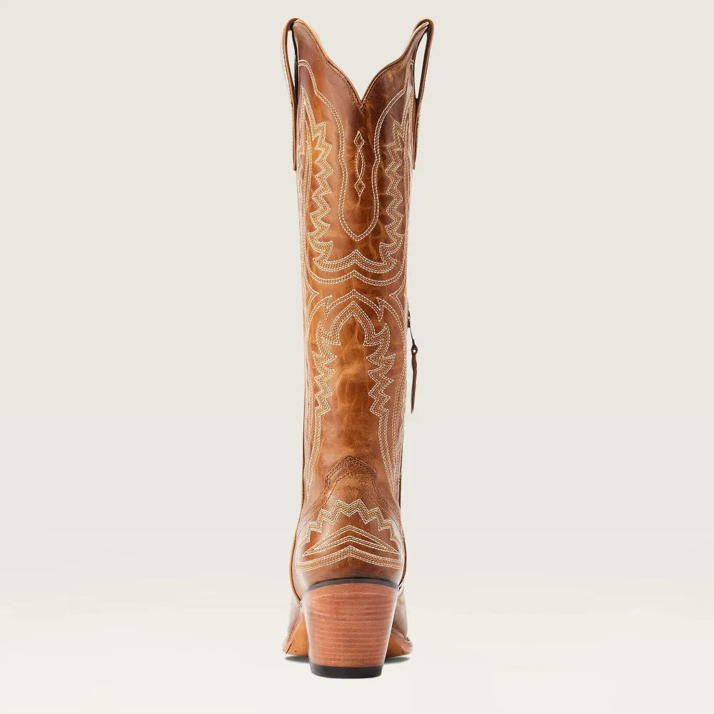 Full body shot of women's stylish knee-high patterned boots, featuring a pointed toe and practical zip.