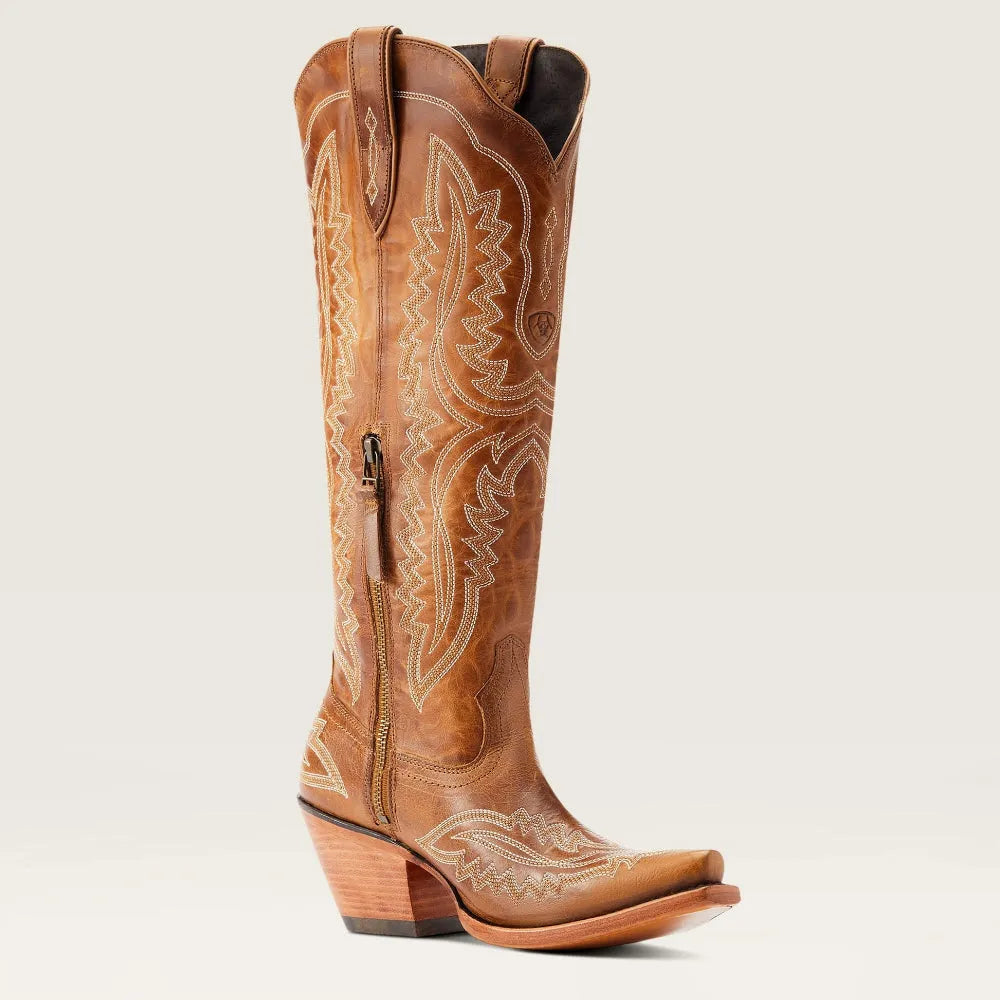 Detailed patterned women's tall boots with a pointed toe, zip closure, and comfortable stacked heel.