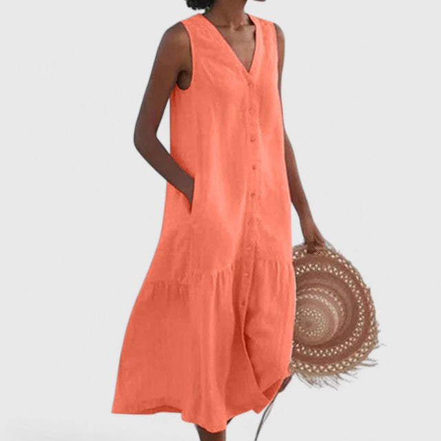 Flowy women's summer vacation dress. Relaxed, versatile midi style perfect for elegant outings.