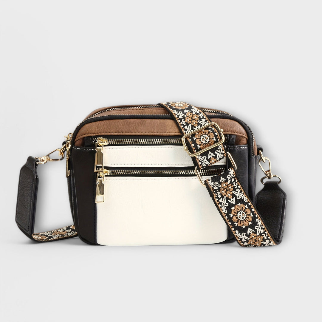 Chic women's retro crossbody bag, brown vegan leather, featuring a stylish & adjustable boho strap.