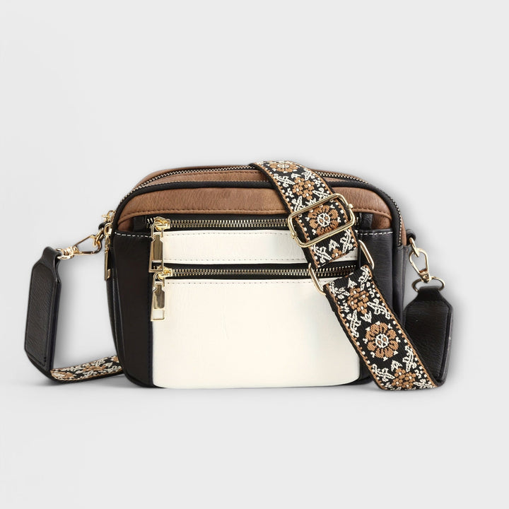 Chic women's retro crossbody bag, brown vegan leather, featuring a stylish & adjustable boho strap.