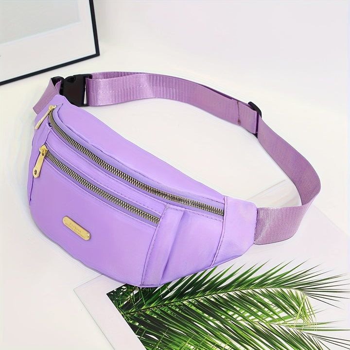 Everyday women's lightweight travel bag with adjustable strap and multi-zip pockets for organization.