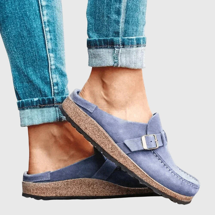 Slip-resistant women's orthopaedic clogs, ensuring comfort, stability, & arch support for effective pain relief.