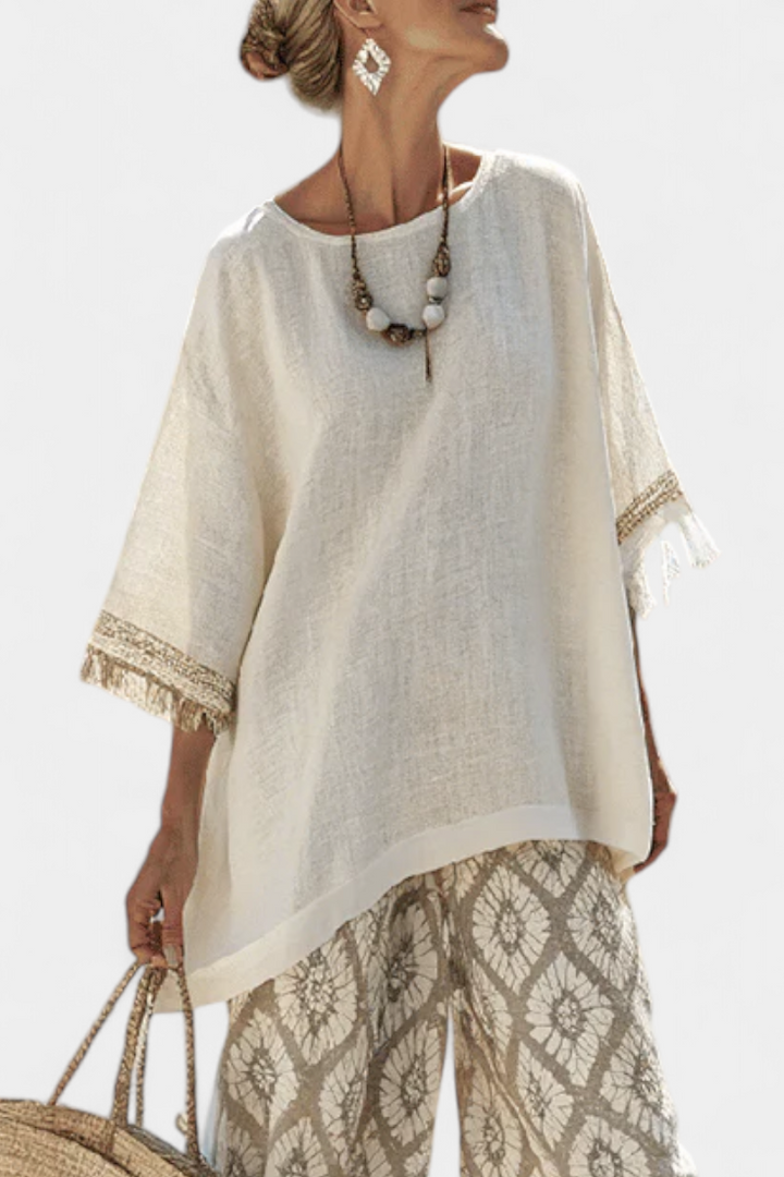 Breezy women's summer top & relaxed wide-leg trousers set. Casual chic matching outfit for resort wear.