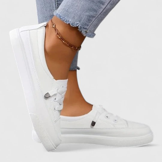Lightweight women's walking footwear with orthopaedic support and breathable design for comfort.