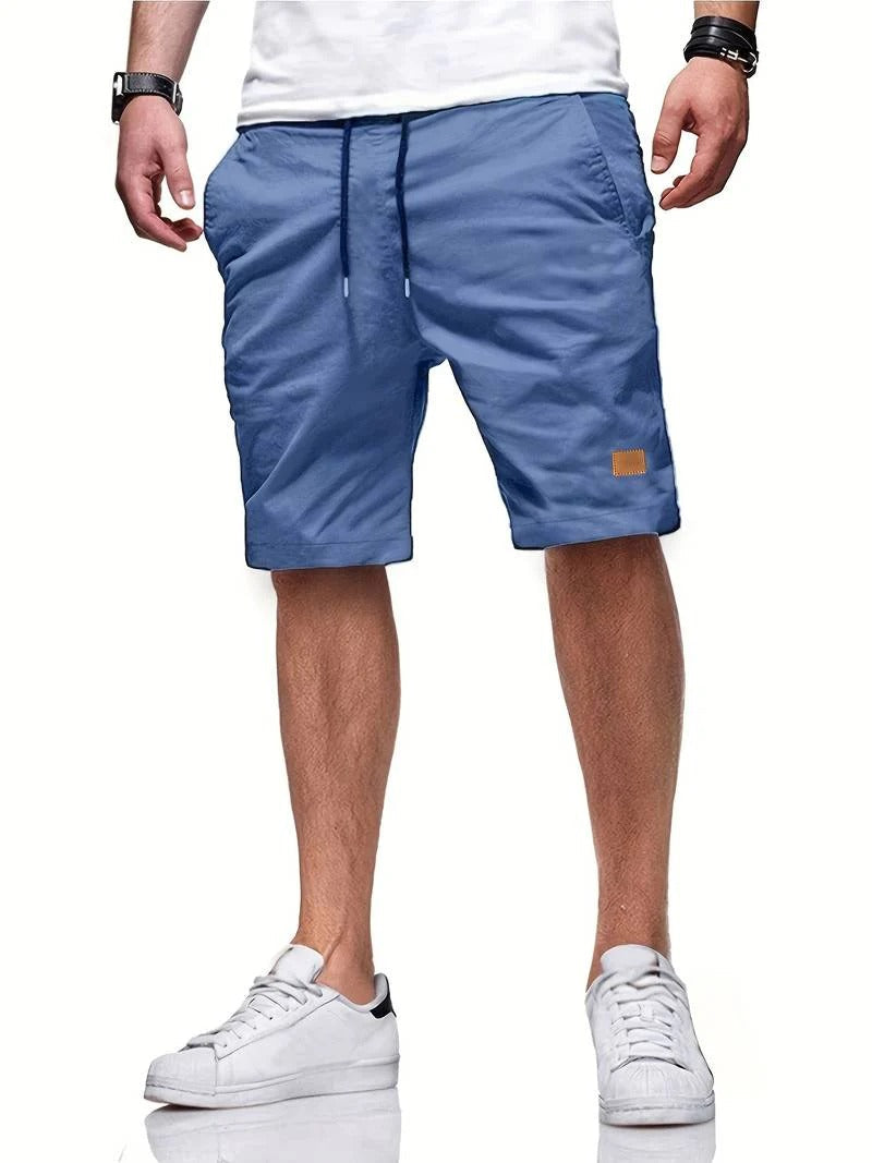 Athletic men's drawstring shorts, ideal for summer activities, ultimate comfort & movement.