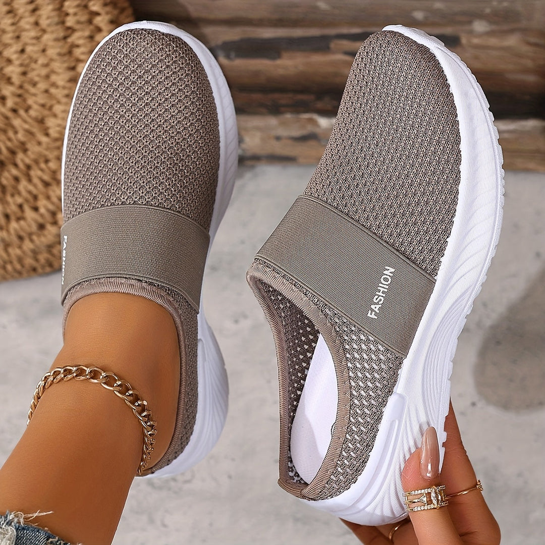 Breathable mesh women's slip-on sneakers, perfect for active summer days & relaxation.