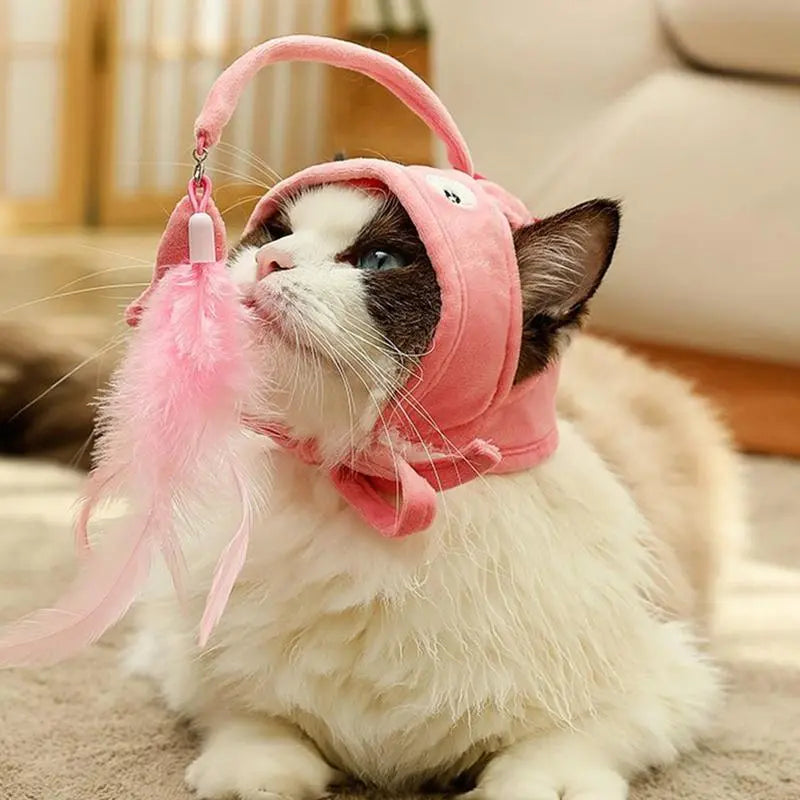 Funny cat costume hat with an interactive toy pendant, perfect for playful felines.