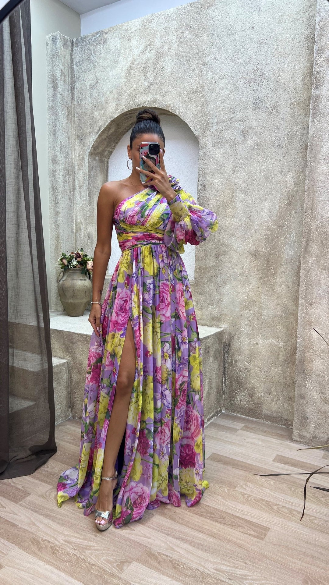 Flowy asymmetrical floral maxi dress for women, featuring a split, ideal for vacation, parties & beach.