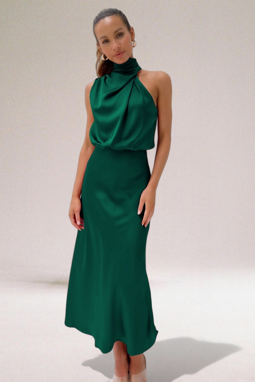 Beautiful flowing halter neck maxi dress for women, ideal for special occasion elegance.