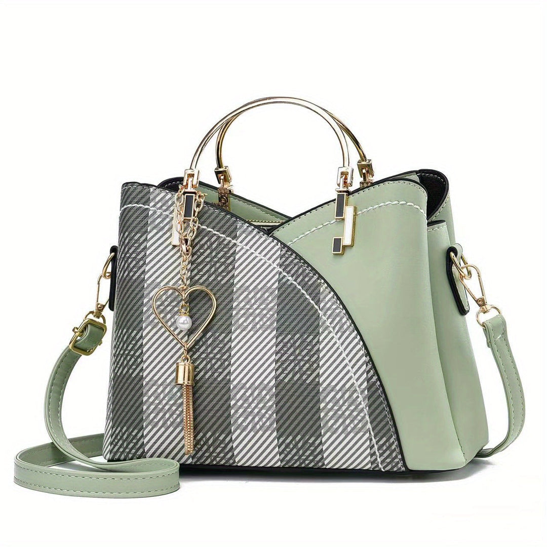 Women's spacious luxury leather handbag, a stylish and practical everyday shoulder bag.
