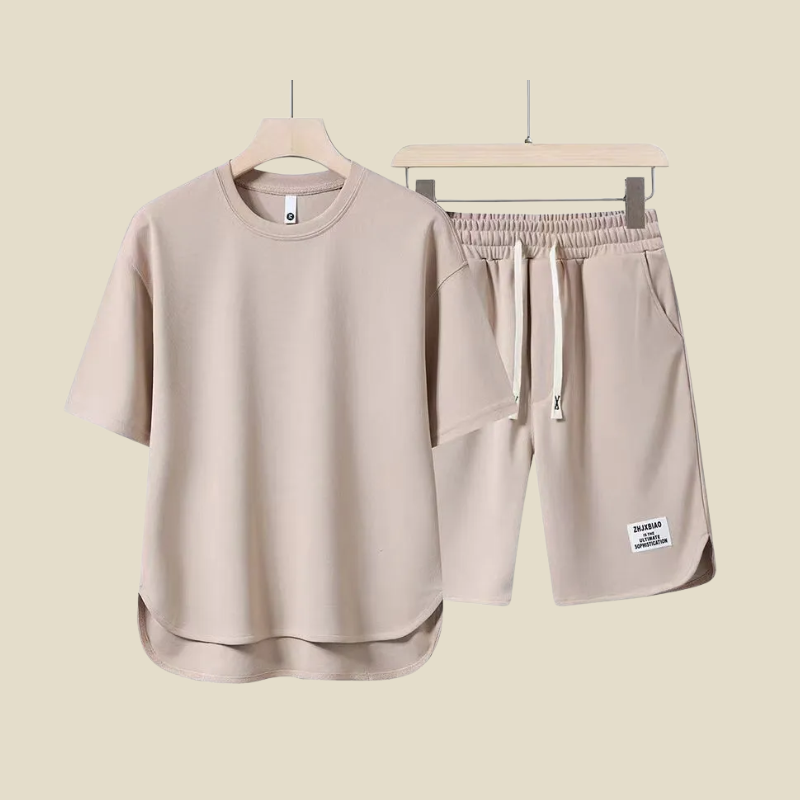 Comfortable men's two-piece casual set featuring a short sleeve t-shirt and drawstring shorts for summer.