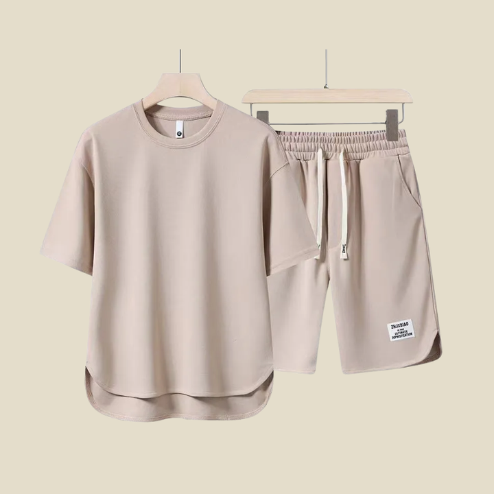 Comfortable men's two-piece casual set featuring a short sleeve t-shirt and drawstring shorts for summer.
