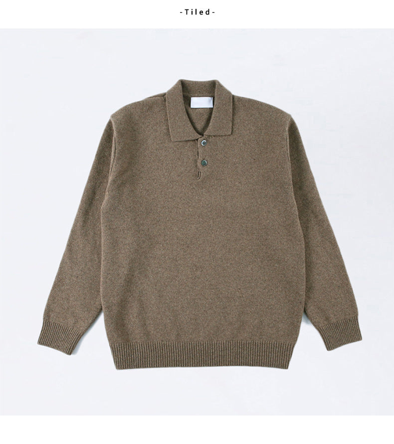 Man wearing a stylish ribbed knit polo sweater. This long sleeve pullover offers smart casual comfort.