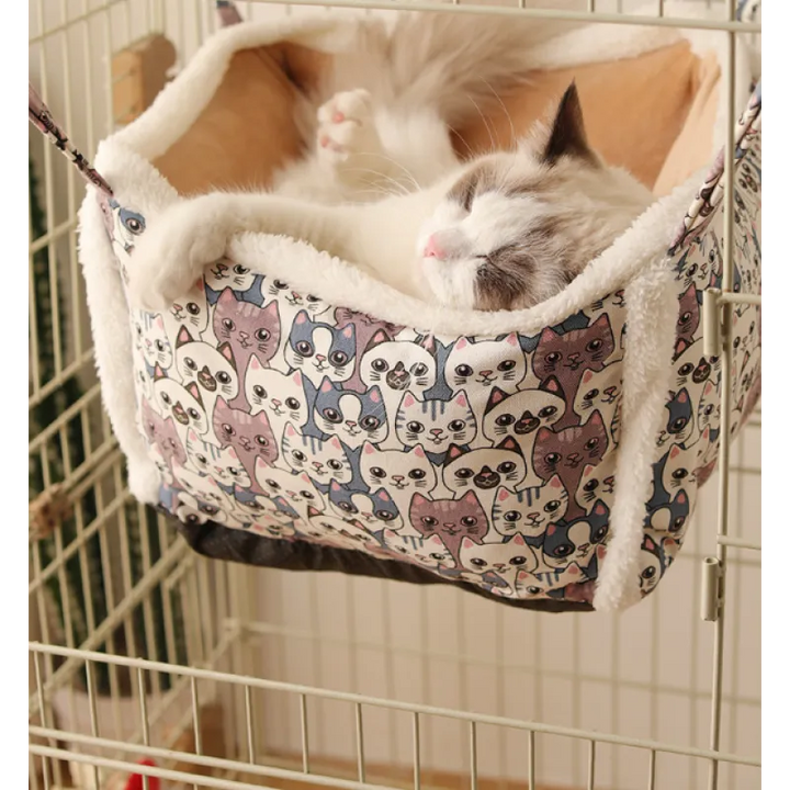 Soft, round cat sleeping basket, plush and cozy, with an adorable pattern for pet relaxation.