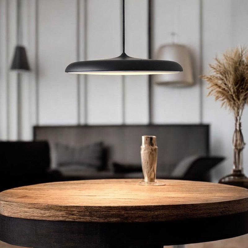 Smooth Nordic LED pendant lamp. Modern Scandinavian ceiling light for stylish, energy-efficient home interiors.