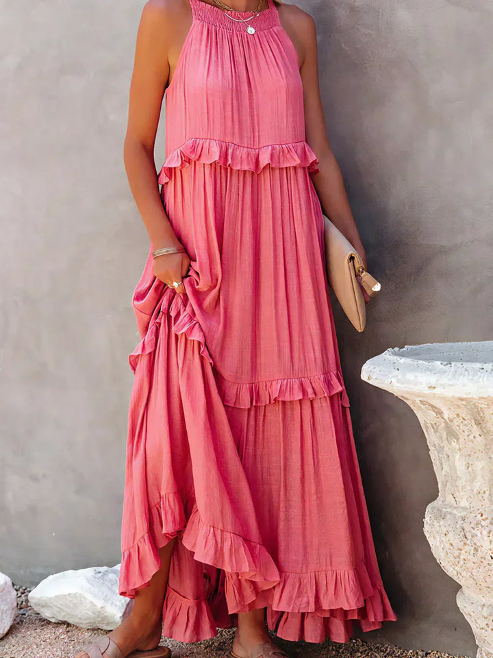 Flowy green halterneck maxi dress, ruffles & pockets, great for casual summer wear.