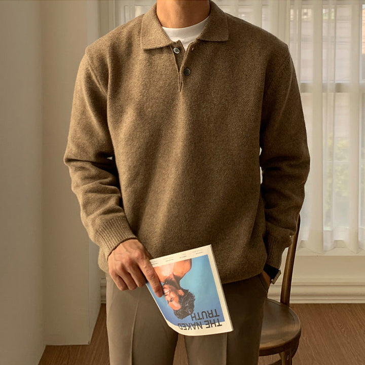 Stylish men's collared knit polo sweater featuring a refined button placket. Ideal for smart casual menswear.