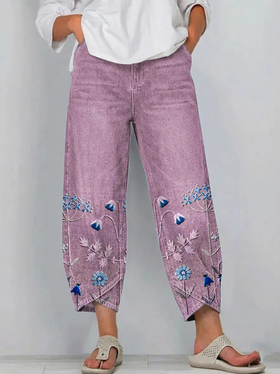 Casual women's boho floral print trousers. Perfect lightweight summer pants with a vibrant pattern.