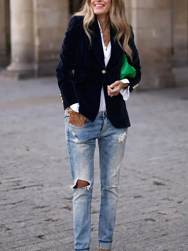 Perfectly tailored single-button blazer for women, offering a professional and elegant silhouette.