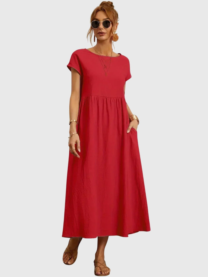 Stylish women's summer pocket dress in a relaxed fit, perfect for versatile everyday casual wear.
