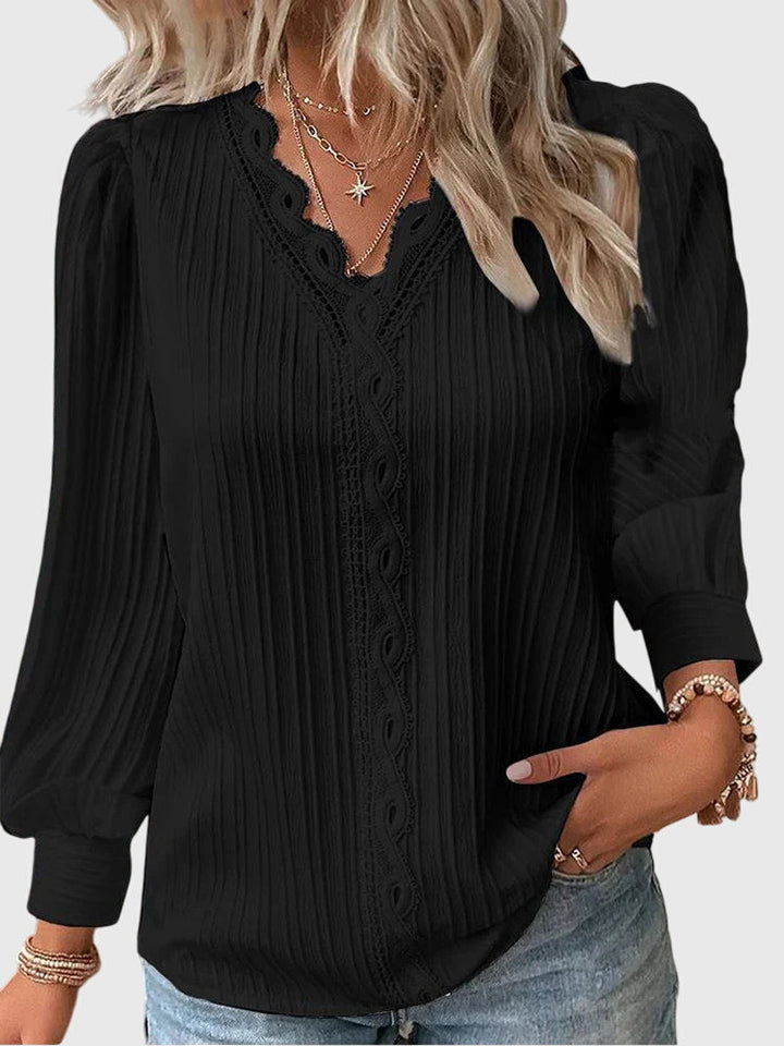 Classic women's elegant pullover blouse. Comfortable long sleeve top for casual chic or professional look.
