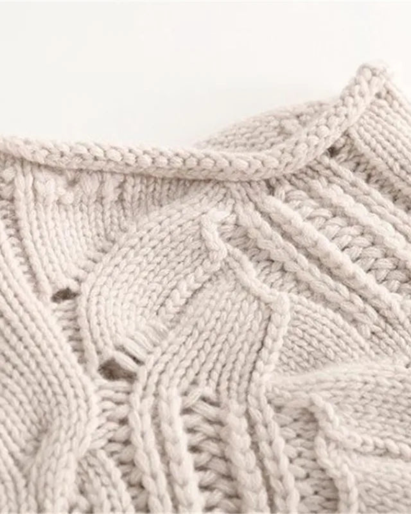 Elegant women's long sleeve knit sweater, ideal for comfortable layering in fall & winter fashion.