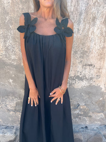 Feminine women's long maxi dress with elegant bow straps and a flattering U-neck for a graceful look.