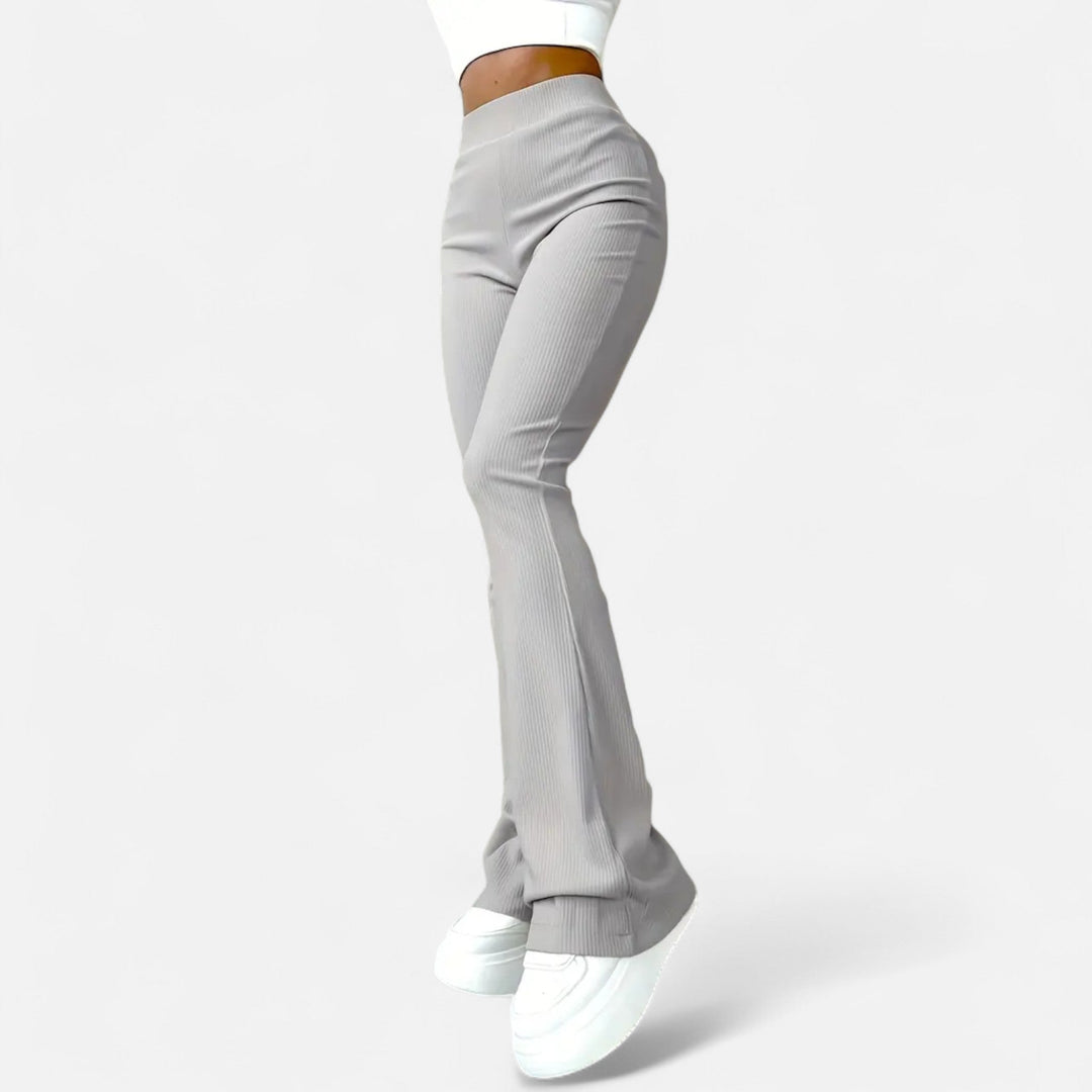 Sleek women's high-waist ribbed slim leggings, fashionable pants offering comfort & an elegant look for daily wear.