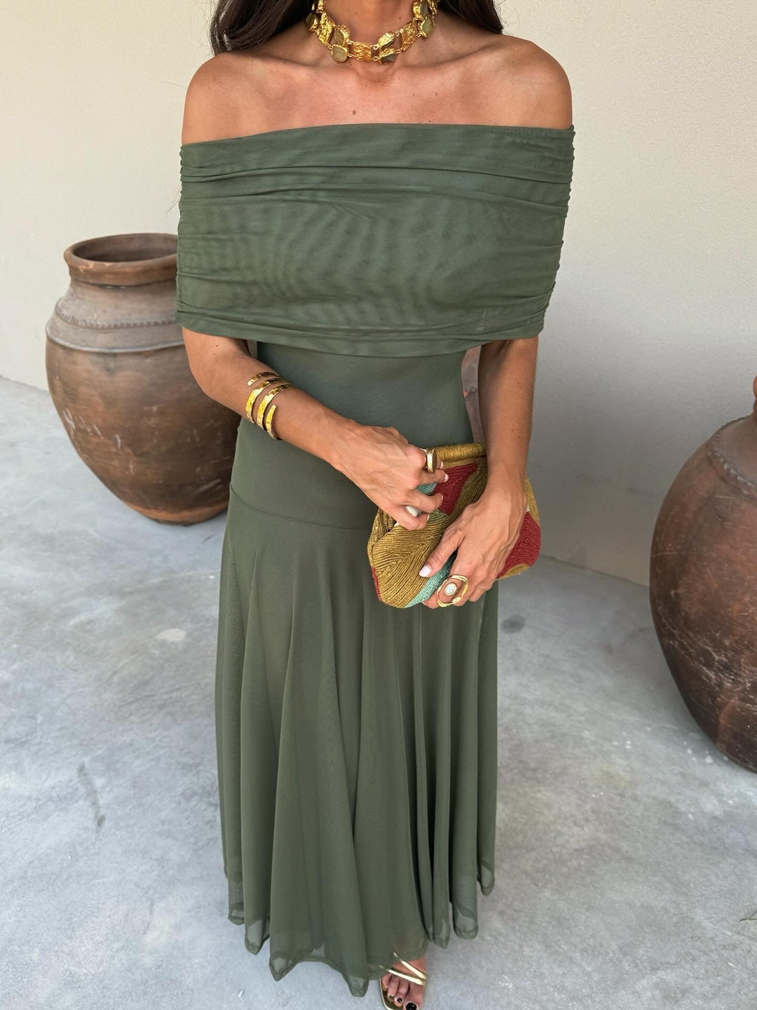 Women's sophisticated one-shoulder maxi dress, an elegant flowing gown for special occasion wear.