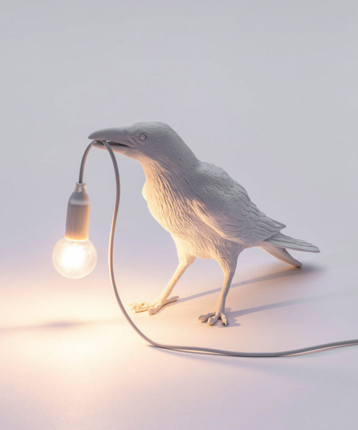 Elegant crow design table lamp, artistic and decorative lighting for a sophisticated home aesthetic.